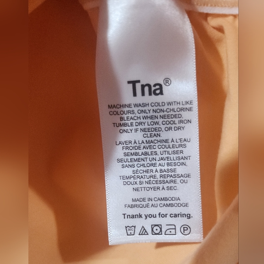 ✨️Aritzia TNA Chill Malibu Ruched Side Short Sleeve Crop Top in Peach | Size XS - Picture 5 of 5